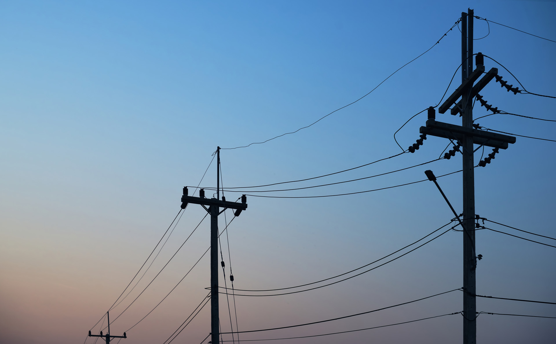 electric-pole-with-clear-blue-sky-WUR3NRK.jpg